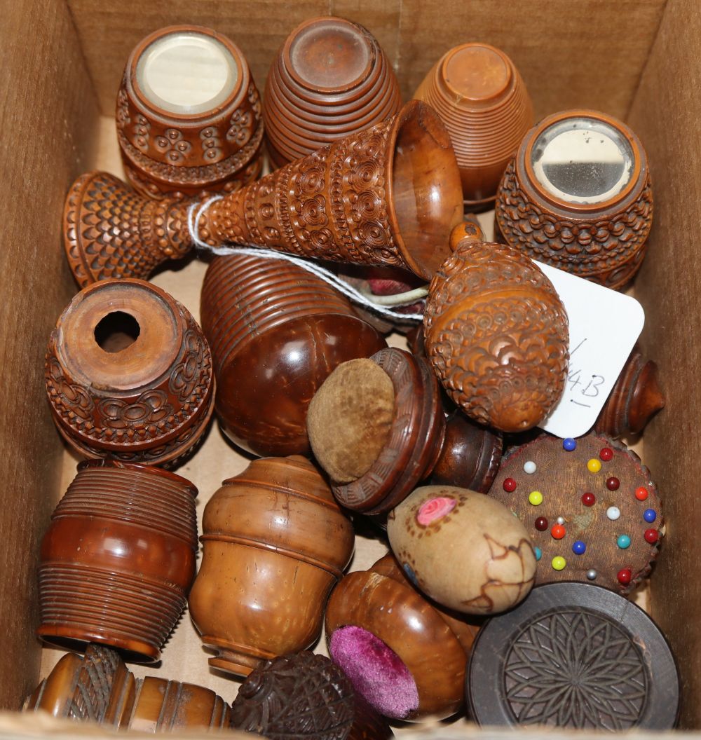 A group of 19th century coquilla nut sewing, games related etc barrel, basket and acorn shaped containers